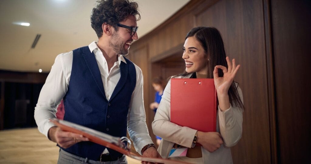 Two hotel employees talking